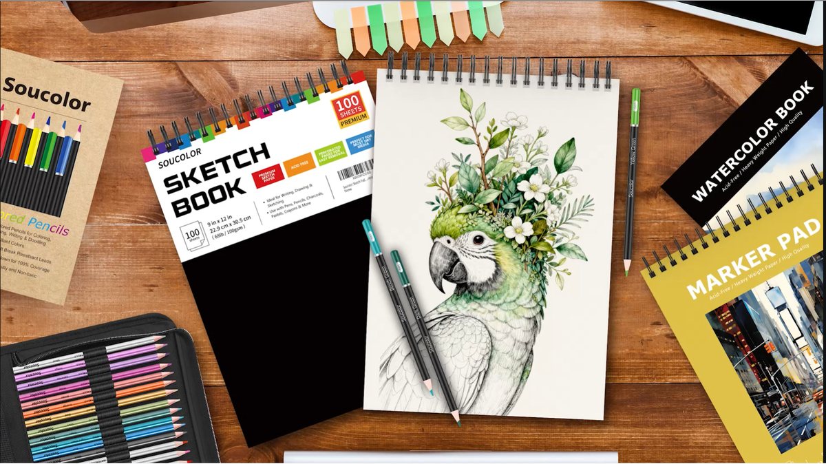 Soucolor sketchbooks and markers on a desk